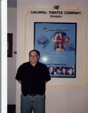 Gagnon next to his photography on Caldwell Theatre Bill Board