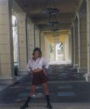 Briana in school girl pose