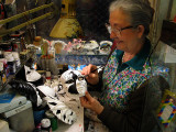 Artist painting a mask at Cesare Rossi ..  0333