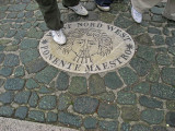 Piazza  San Pietro,  a stone plaque by Bernini depicting one of the four winds. .. 3192