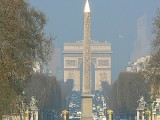 Glowing Obelisque at Concorde Sq., Arc de Triomphe, & La Defense in the background
