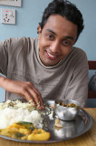 Our porter Gopal eats by hand