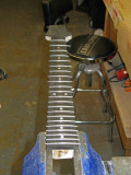 Day 5 - Neck with fret wire inserted prior to trimming