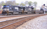 NS 8915 (with a unique frame stripe) leads a Southbound past CT tower 