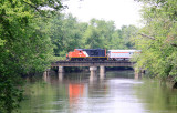 CIRR 7042 trails 765s train across the Kankakee river