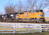 New UP power leads NS 704 at Vanarsdale 