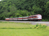 The R.J. Corman Derby train rolls down Benson valley in a typical Derby day rain 