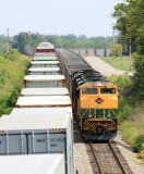Stacks on the main, coal in the hole. Train 23G passes 77J at Waddy 