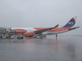1312 15th January 2008 My Travel A330 at a wet Sharjah Airport.JPG