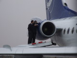 1510 15th January 2008 Running repairs in the rain at Sharjah Airport.JPG