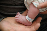 Aydens Foot in Marcs Hand.jpg