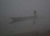 Rapti River and dugout in the mist