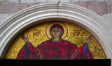 Mosaic above Sveti Trojica church door Budva