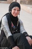 Young woman taking a break in Bayn al-Qasrayn, Palace Walk