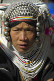 An Akha woman never removes her head-dress