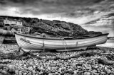 Undersized Boat at Chesil Cove in Black and White