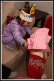 Excitedly opening her present!