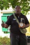 Larry holding a bottle of Curacao at the Chobolobo Liquor Factory