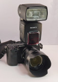 THE  NEX-7 WITH THE SONY/ZEISS 24mm F/1.8 LENS AND THE SONY HVL-F58AM FLASH ATTACHED