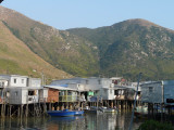 Stilted Huts under the hill