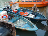 Selling seafood on skiff