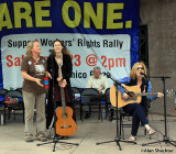 Sherri Quammen (left), Mandalyn May, and Vera Bridges lead a sing-along version of If I Had a Hammer