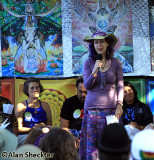 Activist/astrologer/national radio host Carolyn Casey at a panel on Todays Activism: What You Can Do Now on the Wisdom Stage