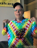 KZFR General Manager Rick Anderson shows off station T-shirt