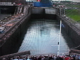 Panama Canal -front camera view of ship going in the Gatun Locks, gates opening