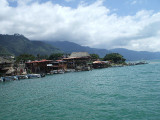 Puerto Quetzal, Guatamala-shacks and huts along the water