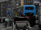 Blue bus on a grey day