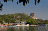 Marble Boat among other ferries on Kunming Lake with Buddhist Fragrance Pavilion on Longevity Hill Summer Palace Beijing
