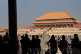 Silhouetted visitors viewing the Hall of Supreme Harmony from the Gate in the Forbidden City Beijing