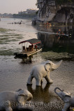 Elephant sculptures on the shore of the Li River at Elephant Trunk Hill Guilin China