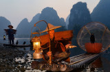 Chinese fishermen with cormorants at dawn on the Li river Yangshuo China