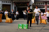 Outdoor competition of restaurant wait staff carrying plates with ping pong balls in Huangshan China