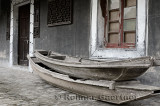 Ancient boathouse and abandoned boats at Shanghai Pudong Lingkong Gardens China