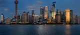 Dusk red glow on high rise financial towers and hotels in the Pudong east side of Shanghai China