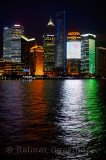 I love Shanghai lights of Pudong high rise towers at night reflected in the Huangpu river China