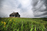 Summer  Storm Clouds and Old House Tyvan SK.
