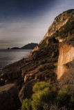 sunlit clifts at Happy bay