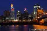 Downtown Cincinnati and the Downtown Cincinnati and the Roebling Suspension Bridge at Night