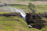 Waterfall in a strong wind