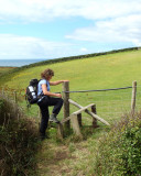 Climbing over fence