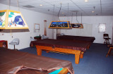 THE BILLIARDS ROOM HAS THREE REGULATION TABLES AND SEVERAL TOURNAMENTS EACH YEAR