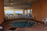 IF IT IS RAINING WHICH AT JOJOBA HILLS IS NOT THAT OFTEN YOU CAN USE THE UNDER THE PATIO JUCUZZI WHICH IS COOLER