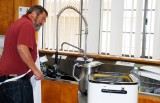 DON HELPS OFTEN IN THE KITCHEN AND THAT MEANS WASHING DISHES