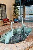 AS YOU ENTER THE MAIN COMPLEX YOU ARE GREETED WITH THE SIGHT AND SOUNDS OF THIS WATER SCULPTURE AND GATE TO THE POOL