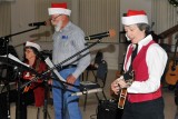 THE CHRISTMAS PARTY BROUGHT OUT A VARIETY OF MUSICIANS WHO PLAY IN PERFECT HARMONY
