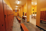 THE INTERIOR OF THE LOCKER ROOM IS SOFTLY LIT AND THE BETTER FITNESS CLUBS KEEP THEM SPOTLESS